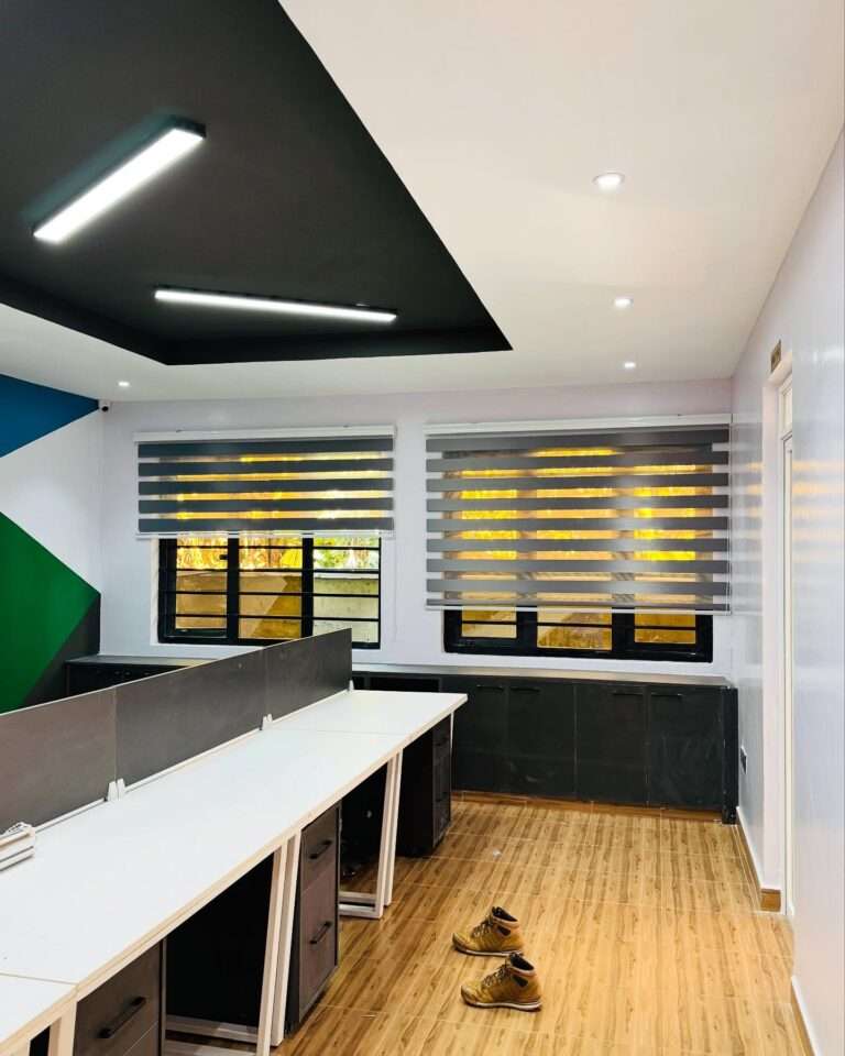 Stylish zebra blinds in a Nairobi living room by Kalus Top Curtains