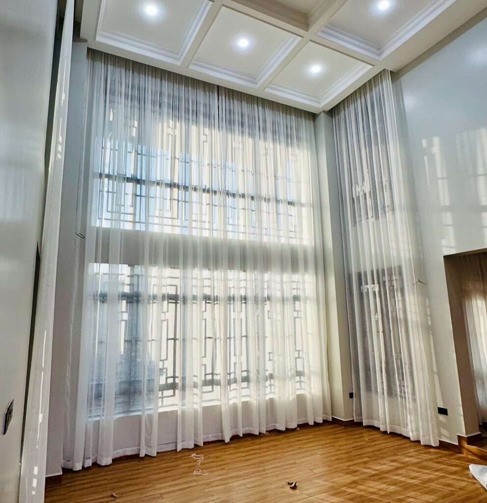 beautiful curtain installation that turned this home into a cozy, stylish space in thika town kenya east africa drapery supply and installation