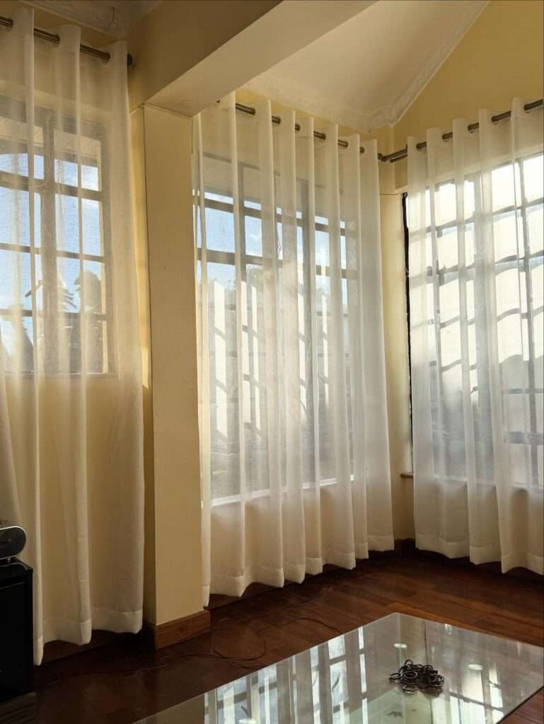 residential installation in kenya east africa of beautiful sheers, letting in light while keeping it classy