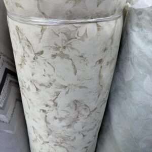 Different curtain fabric materials including sheer, linen, and blackout fabrics displayed