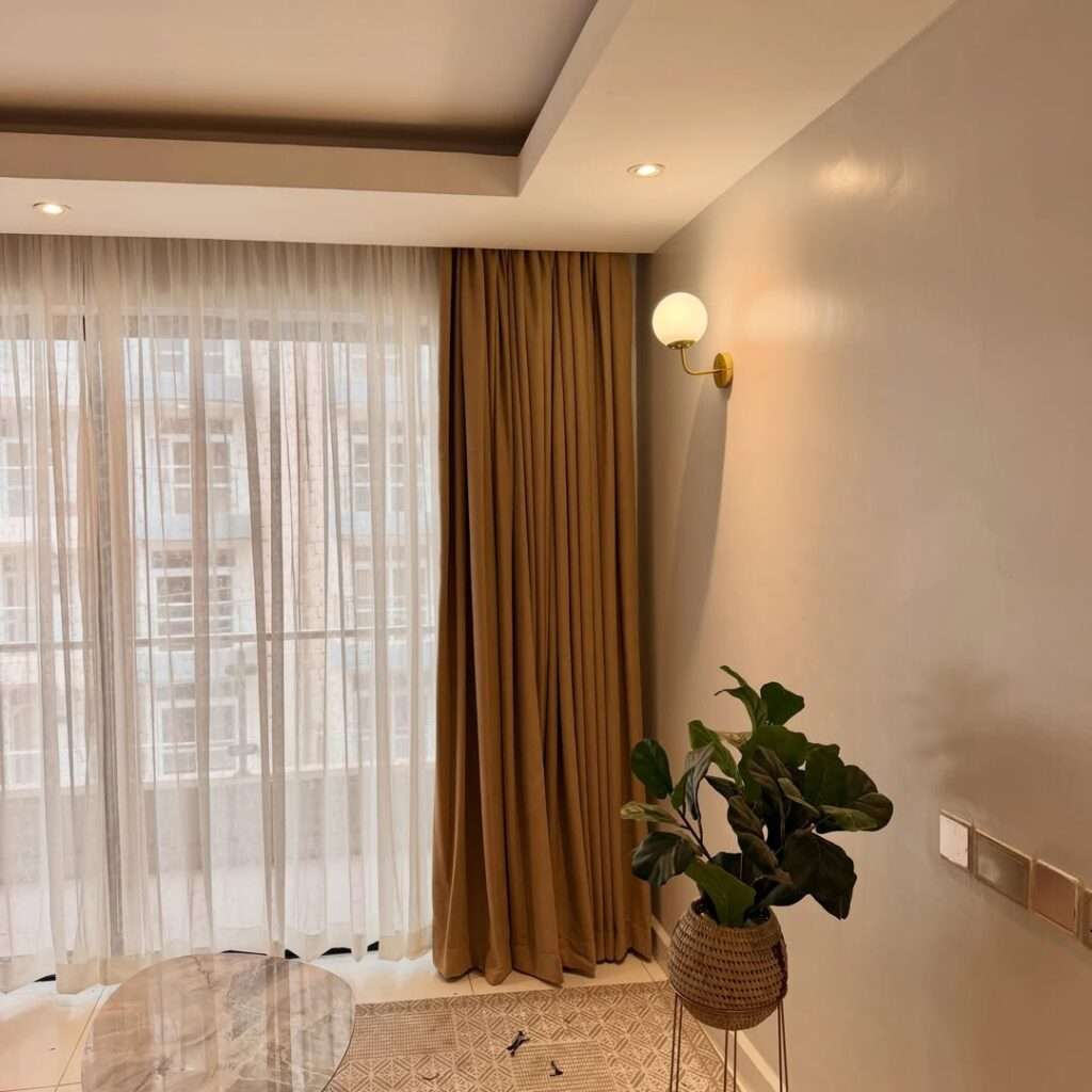Smart window coverings automatically adjusting to natural sunlight in a modern home
