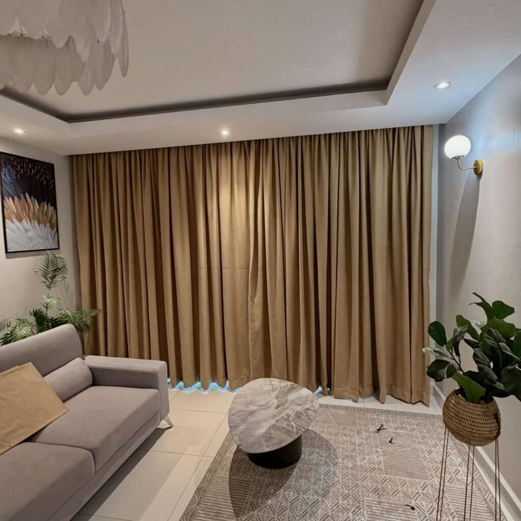 Smart window coverings automatically adjusting to natural sunlight in a modern home