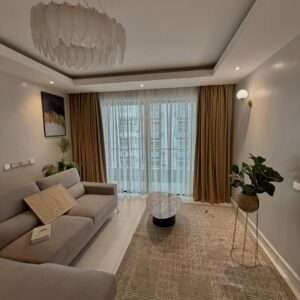 Smart window coverings automatically adjusting to natural sunlight in a modern home