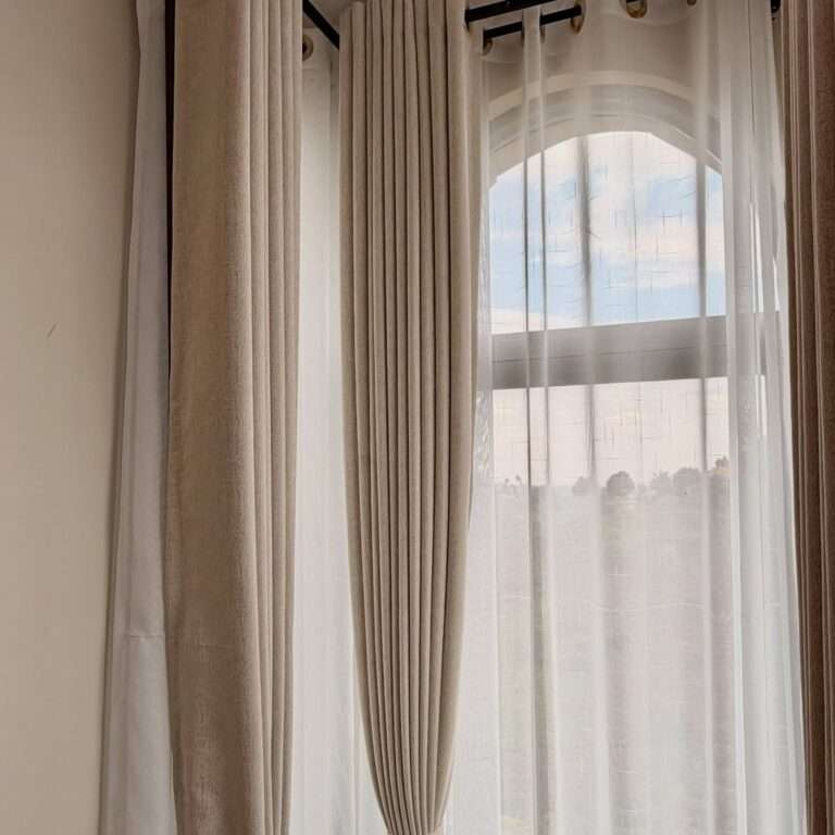 Curtains for coastal homes in Kenya featuring light fabrics and elegant window treatments
